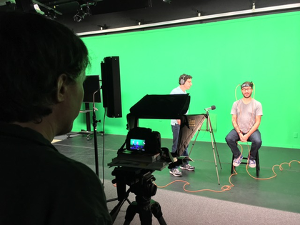 Actor Wil Wheaton being recorded in front of green screen